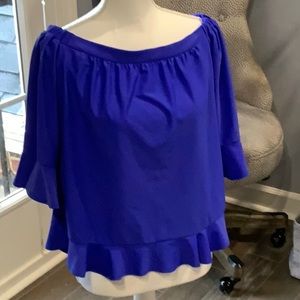 Jude Connally blue shirt